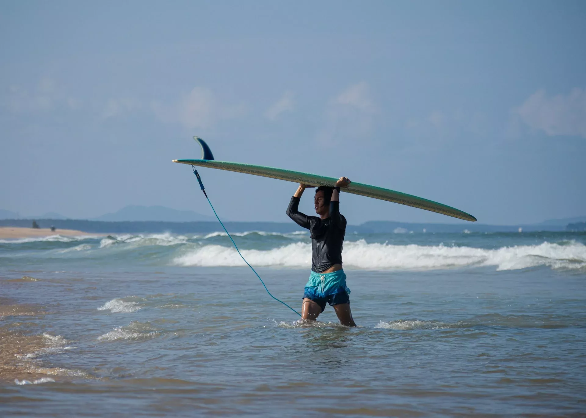 longboarder beach